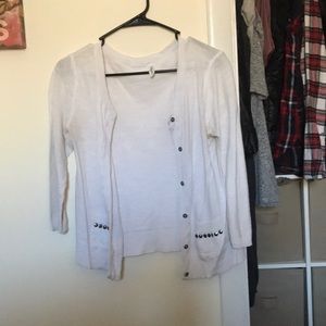 White Cardigan with studs.